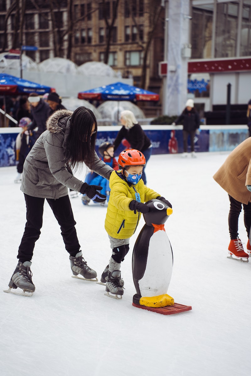 Mother and Son Going on Skating Rink